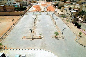 Aerial record of Alhamra Park during the works: base paving, kerbs and lighting columns in place, planting not yet begun