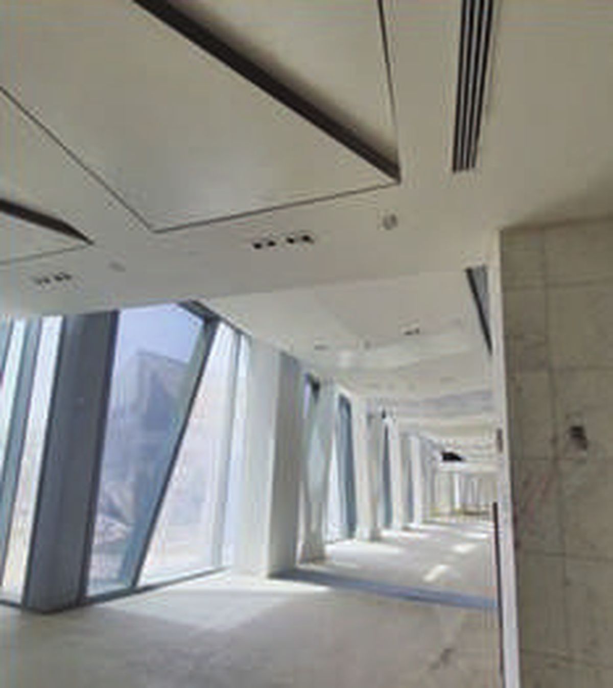 Completed interior corridor with finished walls and ceiling